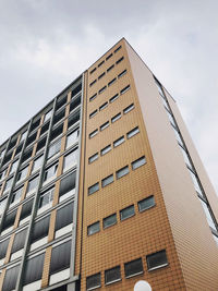 Low angle view of modern building against sky