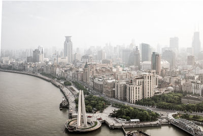 High angle shot of cityscape against clear sky