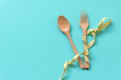 High angle view of tied up on blue table