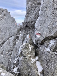 Rock formation on land against sky