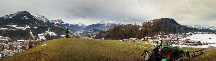 Panoramic view of snowcapped mountains against sky