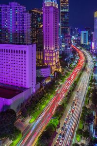 High angle view of light trails on city at night