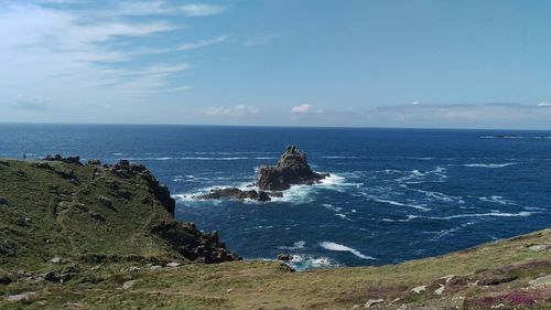 Scenic view of sea against blue sky