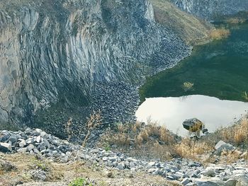 High angle view of rock formation in sea