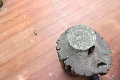 High angle view of leaf on wooden table