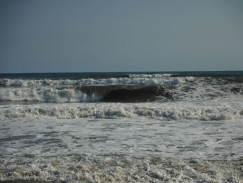 Scenic view of sea against clear sky