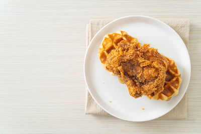 Directly above shot of food in plate on table