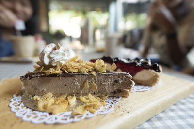 High angle view of dessert on serving board at table