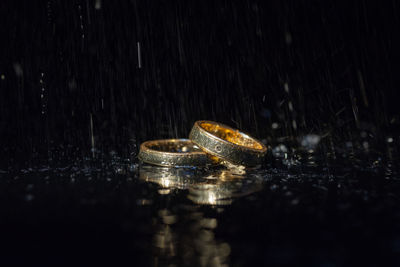 Close-up of raindrops on table