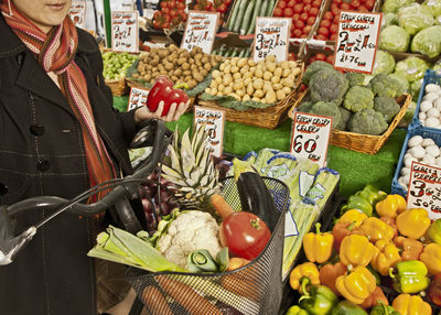 Woman shopping at local produce market