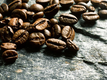 Close-up of coffee beans on table