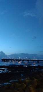 Scenic view of sea against blue sky