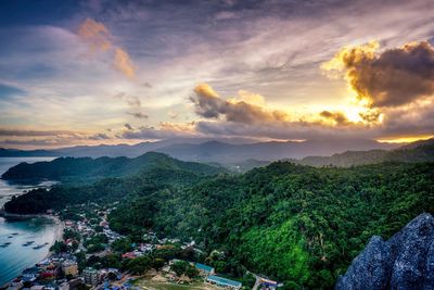 Scenic view of landscape against sky during sunset