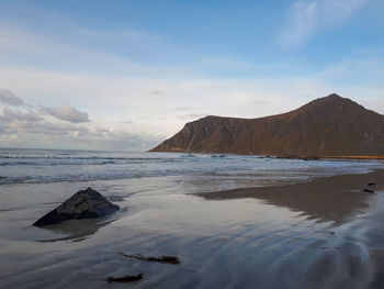 Scenic view of beach against sky