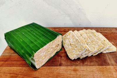 High angle view of bread on cutting board