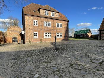 Exterior of old building against blue sky