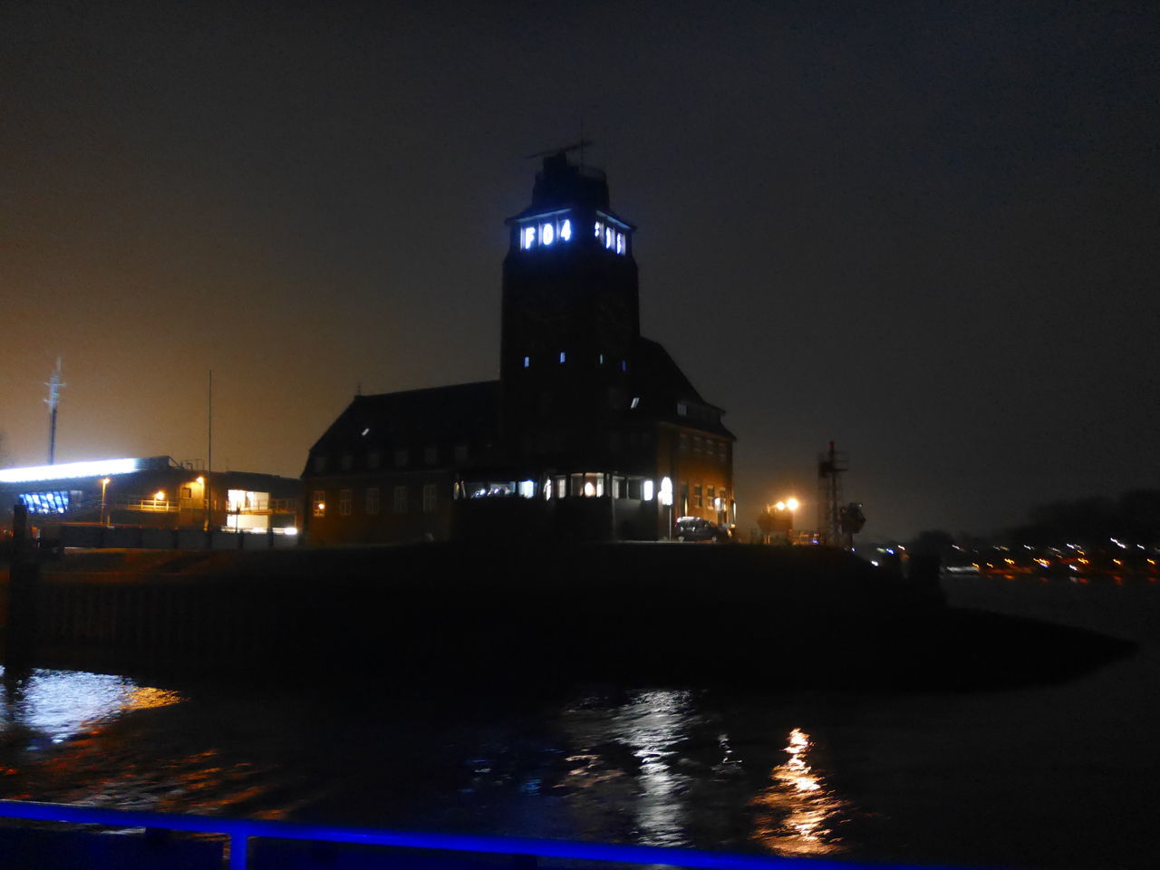 VIEW OF BUILDING AT NIGHT