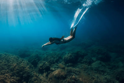 Man swimming in sea