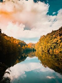 Scenic view of lake against sky during autumn