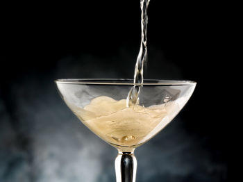 Close-up of wineglass on glass
