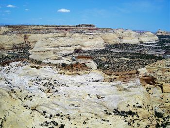 Rock formation on land against sky
