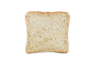 Close-up of bread on white background