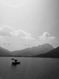 Boats sailing in sea