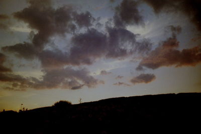 Low angle view of dramatic sky at sunset