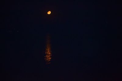 Scenic view of moon in sky at night