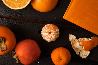 High angle view of orange fruits on table