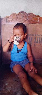 High angle view of cute baby girl sitting