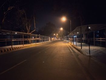 Illuminated road at night