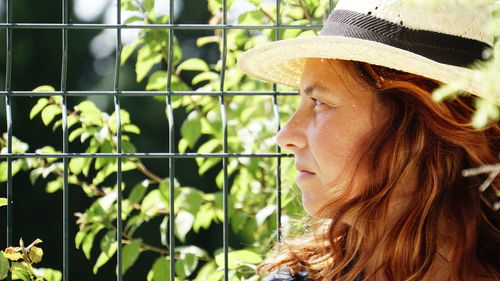 Close-up portrait of woman looking away