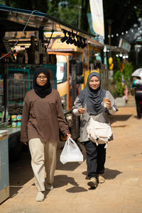 People walking at construction site