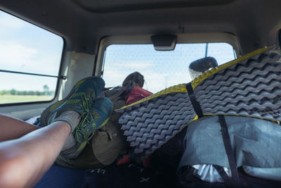 Rear view of people sitting in bus