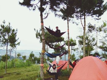 People on field against sky