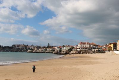 Scenic view of beach and sea against sky