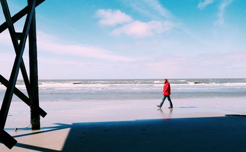 Woman standing on beach