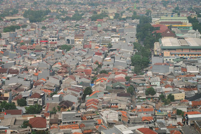 High angle view of houses in city