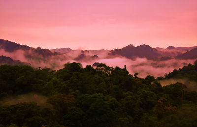 Scenic view of mountains against sky during sunset