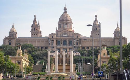 View of buildings in city against sky