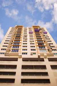 Low angle view of modern building against sky