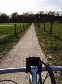 Road passing through field