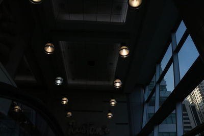 Low angle view of illuminated ceiling