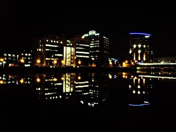 Illuminated cityscape at night