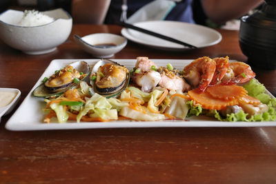 Close-up of food served on table