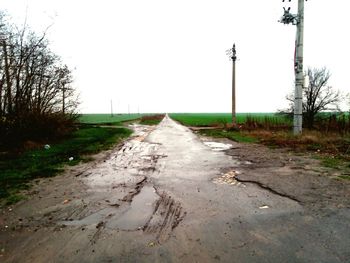 Road passing through field