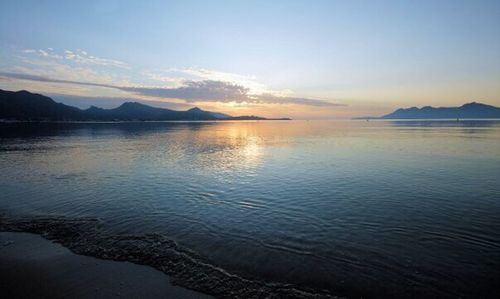 Scenic view of mountains at sunset