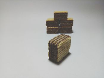 Close-up of stack against white background