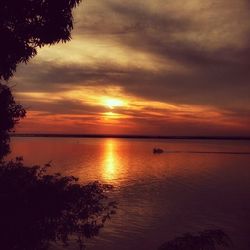 Scenic view of sea at sunset